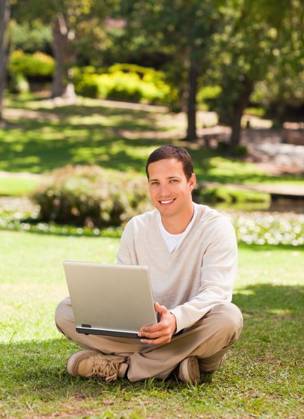 Man working on his laptop in the park Man working on his laptop in the park during the summer, model released, Cape Town, South Africa, 16.11.2010, 59519.jpg, attractive, carefree, garden, green, greenery, handsome, happiness, happy, leisure, lifestyle, outdoor, outside, park, relax, relaxation, smile, summer, smiling, tree, sit, sitting, pose, posing, looking, technology, communication, laptop, notebook, internet, using, working 30s, Mid Adult, Man, Male, Caucasian, Caucasian Appearance, 30-34 Years, Mid Adult Men Outdoors