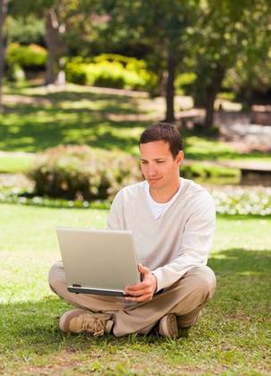 Man working on his laptop in the park Man working on his laptop in the park during the summer, model released, Cape Town, South Africa, 16.11.2010, 59520.jpg, attractive, carefree, garden, green, greenery, handsome, happiness, happy, leisure, lifestyle, outdoor, outside, park, relax, relaxation, smile, summer, smiling, tree, sit, sitting, pose, posing, looking, technology, communication, laptop, notebook, internet, using, working 30s, Mid Adult, Man, Male, Caucasian, Caucasian Appearance, 30-34 Years, Mid Adult Men Outdoors
