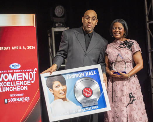 April 4, 2026, Philadelphia, Pennsylvania, United States: DERRICK CORBETT, Senior Vice President of Programming for iHeartMedia holds an award to present to TAMRON HALL, American broadcast journalist, television talk show host and author, receives the WDAS-FM tenth annual Women Of Excellence Legend award at the luncheon held at the Philadelphia Sheraton Philadelphia United States - ZUMArf1_ 20260404_zaf_rf1_028 Copyright: xRickyxFitchettx