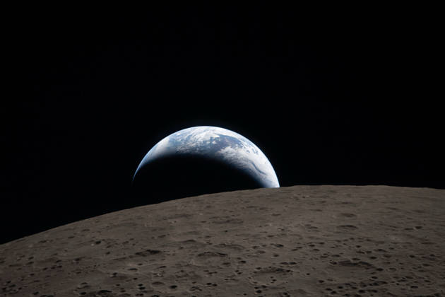 April 7, 2026, Orion Capsule, Outer Space: Earthset, where the blue Earth with bright white clouds sets behind the cratered lunar surface is captured through the Orion spacecraft window at 6:41 p.m. EDT, April 6, 2026, during the Artemis II crewâ€⠢s flyby of the Moon. The dark portion of Earth is experiencing nighttime. On Earthâ€⠢s day side, swirling clouds are visible over the Australia and Oceania region... ..In the foreground, Ohm crater has terraced edges and a flat floor interrupted by central peaks. Central peaks form in complex craters when the lunar surface, liquefied on impact, splashes upwards during the craterâ€⠢s formation. Credit: NASA Orion Capsule Outer Space - ZUMAp138 20260407_zaa_p138_008 Copyright: xNasa Nasax