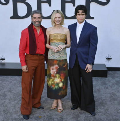 Cast members Oscar Isaac, Carey Mulligan and Charles Melton (L-R) attend Netflix s dark comedy TV series Beef at the Egyptian Theatre in the Hollywood section of Los Angeles on Wednesday, April 9, 2026. Storyline: Road rage ensues after a parking-lot incident, resulting in a bitter feud between the two antagonists. The vendetta between them and the lengths they ll go to in order to wreak revenge on each other spirals out of control, jeopardizing everything and everyone in their lives. LAP2026040908 JIMxRUYMEN