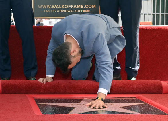 American actor, director and writer Noah Wyle touches his star during an unveiling ceremony honoring him with the 2,840th star on the Hollywood Walk of Fame in Los Angeles on Thursday, April 9, 2026. LAP20260409907 JIMxRUYMEN