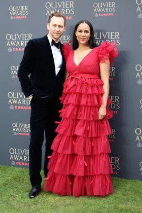 . 12 04 2026. London, United Kingdom. Tom Hiddlestone and partner arriving at The Olivier Awards in London.  xStephenxLockx xi-Imagesx IIM-26693-0030