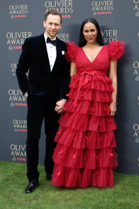 . 12 04 2026. London, United Kingdom. Tom Hiddlestone and partner arriving at The Olivier Awards in London.  xStephenxLockx xi-Imagesx IIM-26693-0034
