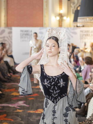 April 12, 2026, Madrid, Madrid, Spain: MADRID, SPAIN - APRIL 12: A model showcases a creation by TRADICIONES ISABELA during the Pasarela EspaoÂ±ola LimeLife at Casino Gran Via on April 12, 2026 in Madrid, Spain. Madrid Spain - ZUMAh199 20260412_zip_h199_009 Copyright: xAaronxHerediax