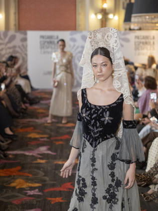 April 12, 2026, Madrid, Madrid, Spain: MADRID, SPAIN - APRIL 12: A model showcases a creation by TRADICIONES ISABELA during the Pasarela EspaoÂ±ola LimeLife at Casino Gran Via on April 12, 2026 in Madrid, Spain. Madrid Spain - ZUMAh199 20260412_zip_h199_011 Copyright: xAaronxHerediax