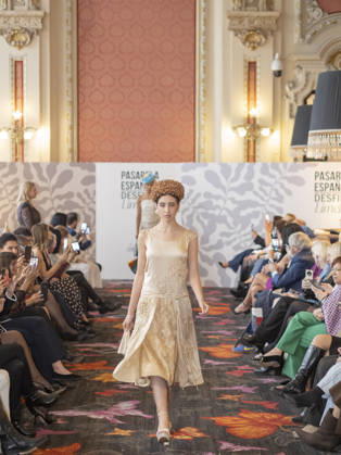 April 12, 2026, Madrid, Madrid, Spain: MADRID, SPAIN - APRIL 12: A model showcases a creation by TRADICIONES ISABELA during the Pasarela EspaoÂ±ola LimeLife at Casino Gran Via on April 12, 2026 in Madrid, Spain. Madrid Spain - ZUMAh199 20260412_zip_h199_016 Copyright: xAaronxHerediax