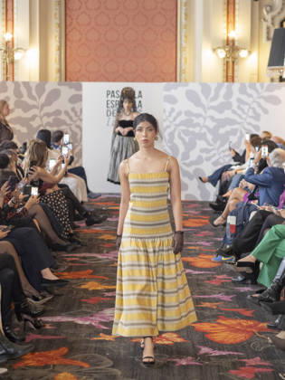 April 12, 2026, Madrid, Madrid, Spain: MADRID, SPAIN - APRIL 12: A model showcases a creation by TRADICIONES ISABELA during the Pasarela EspaoÂ±ola LimeLife at Casino Gran Via on April 12, 2026 in Madrid, Spain. Madrid Spain  - ZUMAh199 20260412_zip_h199_012 Copyright: xAaronxHerediax