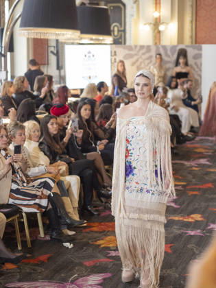 April 12, 2026, Madrid, Madrid, Spain: MADRID, SPAIN - APRIL 12: A model showcases a creation by TRADICIONES ISABELA during the Pasarela EspaoÂ±ola LimeLife at Casino Gran Via on April 12, 2026 in Madrid, Spain. Madrid Spain  - ZUMAh199 20260412_zip_h199_019 Copyright: xAaronxHerediax
