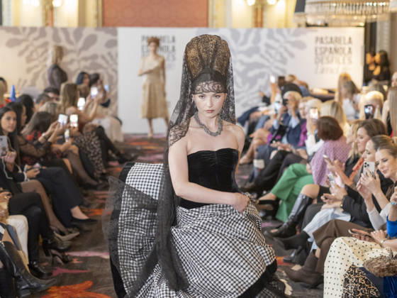 April 12, 2026, Madrid, Madrid, Spain: MADRID, SPAIN - APRIL 12: A model showcases a creation by TRADICIONES ISABELA during the Pasarela EspaoÂ±ola LimeLife at Casino Gran Via on April 12, 2026 in Madrid, Spain. Madrid Spain  - ZUMAh199 20260412_zip_h199_014 Copyright: xAaronxHerediax