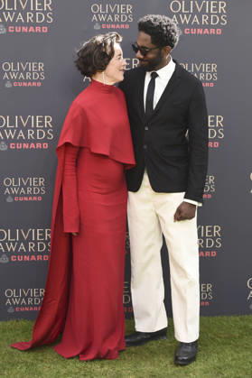 Olivia Williams mit Ehemann Rashan Stone bei der Verleihung der Olivier Awards 2026 in der Royal Albert Hall. 12.04.2026