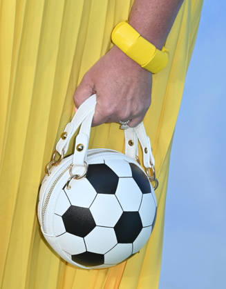 Amazon MGM Studios™s ˜Balls Up™ Premiere Amy Boland Hauser s Soccer Ball Handbag arriving at Amazon MGM Studios™s Balls Up? premiere held at the Harmony Gold Theatre on April 14, 2026 in Los Angeles, CA. Los Angeles Harmony Gold Theatre California USA Copyright: xLeexWattx xAFF-USA.COMx