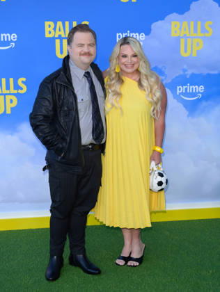 Balls Up Premiere - Los Angeles, USA LOS ANGELES, USA. April 14, 2026: Paul Walter Hauser & Amy Boland Hauser at the premiere for Balls Up at the Harmony Gold Theatre. Los Angeles CA USA  Copyright: xPaulxSmith Featureflashx