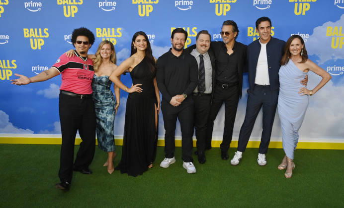 Cast members Eric Andre, Chelsey Crisp, Eva De Dominici, Mark Wahlberg, Paul Walter Hauser, Benjamin Bratt, Sasha Baron Cohen and Molly Shannon (L-R) attend the premiere of the motion picture sports comedy Balls Up at the Harmony Gold Theater in Los Angeles on Tuesday, April 14, 2026. Storyline: Two marketers pitch a bold new condom World Cup sponsorship. After a booze-fueled scandal, they must outrun chaos to survive.  LAP2026041441 JIMxRUYMEN