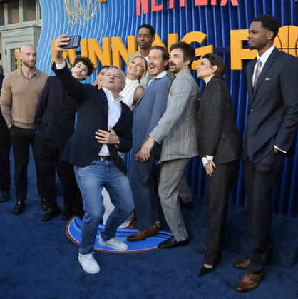 Ted Sarandos takes a selfie off cast members during the premiere of Netflix s Season 2 TV series sport comedy Running Point at the Egyptian Theatre in the Hollywood section of Los Angeles on Wednesday, April 15, 2026..Storyline: Isla Gordon, overlooked her whole life, is appointed President of the LA Waves basketball team, a family business, when her brother enters rehab. She aims to prove she is the right choice despite skepticism.  LAP2026041510 JIMxRUYMEN