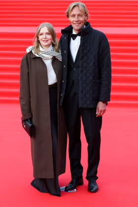 RUSSIA, MOSCOW - APRIL 16, 2026: TV host Nadezhda Korolyova and her husband, film producer Maxim Korolyov, pose on the red carpet during a ceremony to open the 48th Moscow International Film Festival at the Rossiya Theatre Moscow Russia  - ZUMAt113 20260416_zaa_t113_501 Copyright: xValeryxSharifulinx