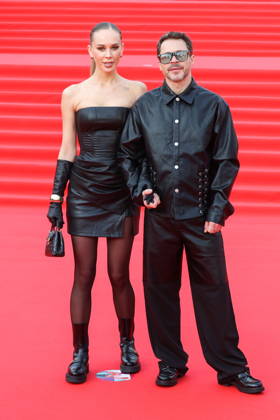 RUSSIA, MOSCOW - APRIL 16, 2026: Actor Pavel Derevyanko poses with his wife Zoya Futs on the red carpet during a ceremony to open the 48th Moscow International Film Festival at the Rossiya Theatre Moscow Russia  - ZUMAt113 20260416_zaa_t113_494 Copyright: xValeryxSharifulinx