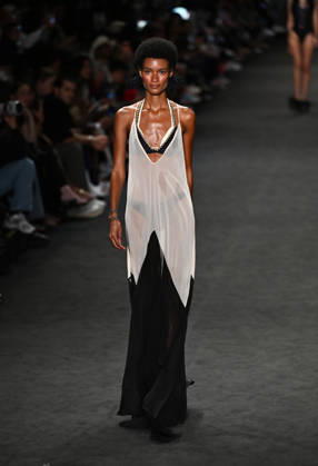 (260417) -- RIO DE JANEIRO, April 17, 2026 -- A model presents a creation by Blue Man during the Rio Fashion Week in Rio de Janeiro, Brazil, April 16, 2026. The Rio Fashion Week 2026 is held in Rio de Janeiro from Tuesday to Saturday, with around 20 fashion brands presenting their latest creations. ) BRAZIL-RIO DE JANEIRO-FASHION WEEK JinxHaoyuan 