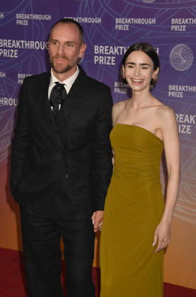 SANTA MONICA, CA - APRIL 18: Charlie McDowell and Lily Collins at the 2026 Breakthrough Prize on April 18, 2026 at Barker Hangar in Santa Monica, California. Copyright: xJeffreyxMayer MediaPunchx