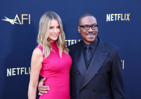 April 18, 2026, Hollywood, California, USA: American Actor and Comedian EDDIE MURPHY, 65, and his Australian Actress wife PAIGE BUTCHER, 46, in a Barbie-pink dress, is on the Red Carpet before Murphy receives the American Film Instituteâ€⠢s (AFI) Life Time Achievement Award on April 18, 2026 in Hollywood, California at the Dolby Theater, Los Angeles. The event is sponsored by Netflix. Hollywood USA - ZUMAk144 20260418_znp_k144_008 Copyright: xAmyxKatzx