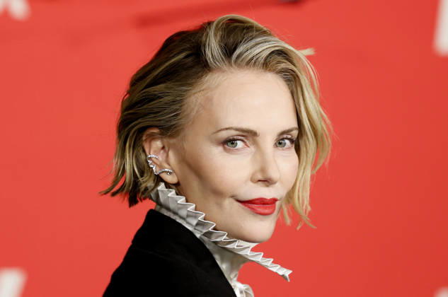 Charlize Theron arrives on the red carpet at Netflix s APEX New York Premiere at The Paris Theater on Wednesday, April 22, 2026 in New York City.  NYP20260422205 JohnxAngelillo