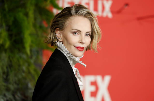 Charlize Theron arrives on the red carpet at Netflix s APEX New York Premiere at The Paris Theater on Wednesday, April 22, 2026 in New York City.  NYP20260422207 JohnxAngelillo
