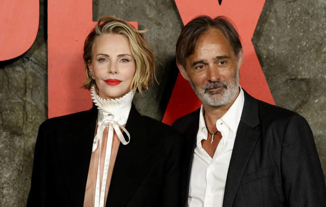 Charlize Theron and Baltasar Kormákur arrive on the red carpet at Netflix s APEX New York Premiere at The Paris Theater on Wednesday, April 22, 2026 in New York City.  NYP20260422212 JohnxAngelillo