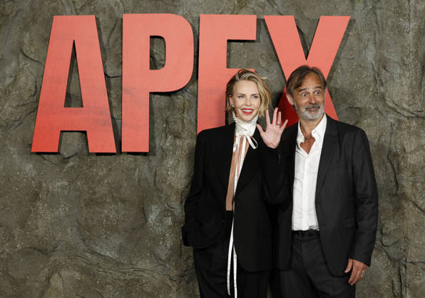 Charlize Theron and Baltasar Kormákur arrive on the red carpet at Netflix s APEX New York Premiere at The Paris Theater on Wednesday, April 22, 2026 in New York City.  NYP20260422213 JohnxAngelillo
