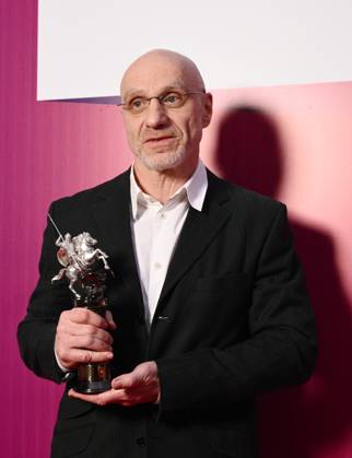 Russia Moscow International Film Festival 9150226 23.04.2026 Film director Viktor Shamirov poses for photos with the Silver St. George for Best Russian Film for his film Temperature of the Universe during the closing ceremony of the 48th Moscow International Film Festival (MIFF) in Moscow, Russia. Kirill Zykov Sputnik Moscow Russia  Copyright: xKirillxZykovx