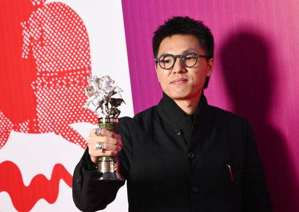 Russia Moscow International Film Festival 9150285 23.04.2026 Chinese film director Zheng Xusong poses for photos with the Silver St. George for the Best Documentary received for his film The Long Way Home during the closing ceremony of the 48th Moscow International Film Festival (MIFF) in Moscow, Russia. Kirill Zykov Sputnik Moscow Russia  Copyright: xKirillxZykovx