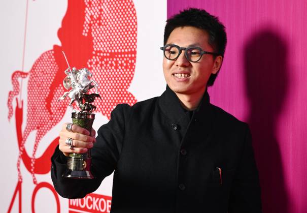 Russia Moscow International Film Festival 9150288 23.04.2026 Chinese film director Zheng Xusong poses for photos with the Silver St. George for the Best Documentary received for his film The Long Way Home during the closing ceremony of the 48th Moscow International Film Festival (MIFF) in Moscow, Russia. Kirill Zykov Sputnik Moscow Russia  Copyright: xKirillxZykovx