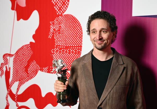Russia Moscow International Film Festival 9150314 23.04.2026 Actor Sergei Gilev poses for photos with the Silver St. George for the Best Actor received for his role in the film Vygotsky during the closing ceremony of the 48th Moscow International Film Festival (MIFF) in Moscow, Russia. Kirill Zykov Sputnik Moscow Russia  Copyright: xKirillxZykovx