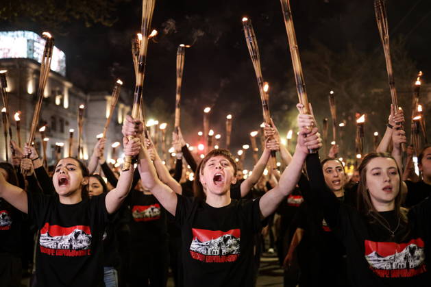 April 23, 2026, Yerevan, Armenia: Thousands of people take part in a torch procession in Republic Square on the eve of Armenian Genocide Remembrance Day. The event is organized annually to honor the 1.5 million victims of the 1915 genocide and to serve as a call for international recognition and justice. Yerevan Armenia  - ZUMAt113 20260423_zaa_t113_493 Copyright: xAlexanderxPatrinx
