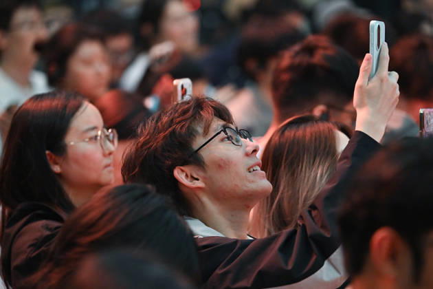 (260424) -- BEIJING, April 24, 2026 -- The audience record at the Juliette Binoche Masterclass held during the 16th Beijing International Film Festival (BJIFF), in Beijing, capital of China, April 24, 2026. Themed A Journey Without Borders: Juliette Binoche s Artistic Exploration , the event featured the professional experience and artistic insights of renowned French actress Juliette Binoche. Binoche is also the jury president of the 16th Tiantan Award of the BJIEF. ) CHINA-BEIJING-BJIFF-JULIETTE BINOCHE MASTERCLASS (CN) LixXin 