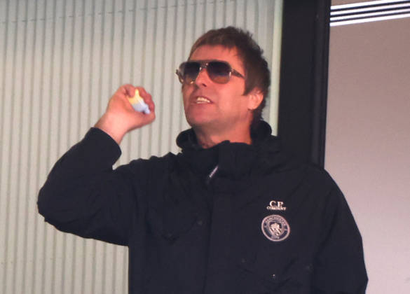Liam Gallagher with what looks like a vape in his hand at the Emirates FA Cup Semi-Final match Manchester City v Southampton, at Wembley Stadium, London, UK on 25th April, 2026. 