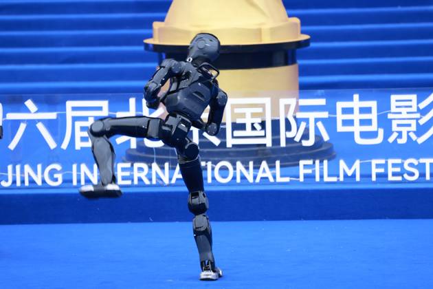 BEIJING, CHINA - APRIL 25: A humanoid robot performs at the closing ceremony of the 16th Beijing International Film Festival on April 25, 2026 in Beijing, China.  Copyright: xVCGx 111637235622
