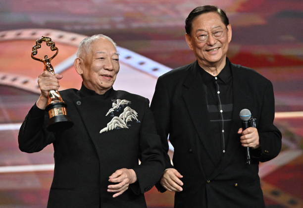 BEIJING, CHINA - APRIL 25: Martial arts choreographer and film director Yuen Woo-ping (L) receives the Lifetime Achievement Award at the closing ceremony of the 16th Beijing International Film Festival on April 25, 2026 in Beijing, China.  Copyright: xVCGx 111637296122
