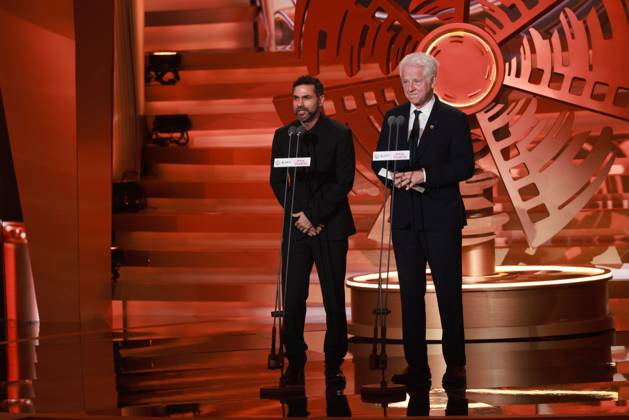 BEIJING, CHINA - APRIL 25: Brazilian film director Gabriel Mascaro and British screenwriter and director Richard Curtis present the Best Screenplay Award to Paul Andrew Williams at the closing ceremony of the 16th Beijing International Film Festival on April 25, 2026 in Beijing, China.  Copyright: xVCGx 111637275416