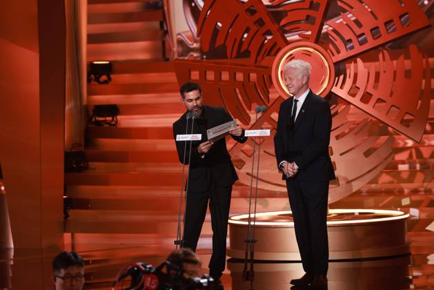 BEIJING, CHINA - APRIL 25: Brazilian film director Gabriel Mascaro and British screenwriter and director Richard Curtis present the Best Screenplay Award to Paul Andrew Williams at the closing ceremony of the 16th Beijing International Film Festival on April 25, 2026 in Beijing, China.  Copyright: xVCGx 111637275697