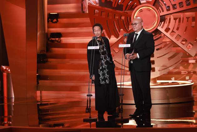 BEIJING, CHINA - APRIL 25: Vietnamese-born French filmmaker Tran Anh Hung (L) and director Cai Shangjun present the Best Director Award to Mike van Diem at the closing ceremony of the 16th Beijing International Film Festival on April 25, 2026 in Beijing, China.  Copyright: xVCGx 111637275516