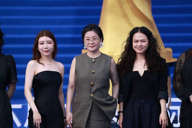 BEIJING, CHINA - APRIL 25: Director Li Shaohong (C) attends the closing ceremony of the 16th Beijing International Film Festival on April 25, 2026 in Beijing, China.  Copyright: xVCGx 111637231364