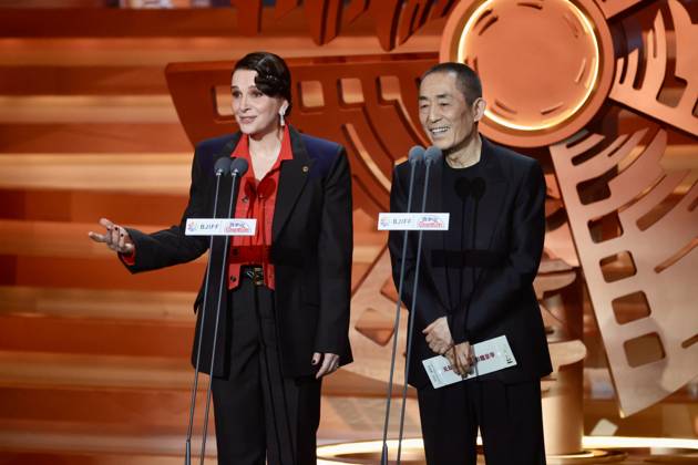 BEIJING, CHINA - APRIL 25: French actress Juliette Binoche and director Zhang Yimou stand on the stage at the closing ceremony of the 16th Beijing International Film Festival on April 25, 2026 in Beijing, China.  Copyright: xChinaxNewsxServicex 111637303789