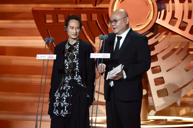 BEIJING, CHINA - APRIL 25: Vietnamese-born French filmmaker Tran Anh Hung (L) and director Cai Shangjun present the Best Director Award to Mike van Diem at the closing ceremony of the 16th Beijing International Film Festival on April 25, 2026 in Beijing, China.  Copyright: xChinaxNewsxServicex 111637303908