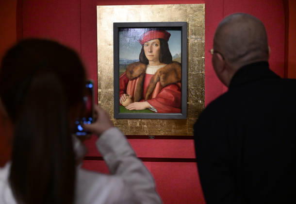 (260427) -- BEIJING, April 27, 2026 -- Visitors view an art work during an exhibition in Beijing, capital of China, April 27, 2026. An art exhibition Homage to the Virtuosos: From Leonardo da Vinci to Caravaggio -- Masterpieces of the Italian Renaissance opens to the public here on Monday. This exhibition displays 36 masterpieces by more than 20 renowned Italian artists from the 15th to the 17th centuries, including Botticelli, da Vinci, Michelangelo, and Raphael. Most of the works are on display in China for the first time. ) CHINA-BEIJING-ITALIAN RENAISSANCE-EXHIBITION (CN) LixHe 