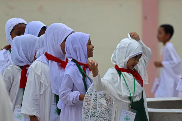 April 27, 2026, Banda Aceh, Aceh, Indonesia: Kindergarteners children performing tawaf around a miniature Kaaba during Hajj manasik education at the Aceh Hajj Embarkation Dormitory in Banda Aceh City, Aceh province, Indonesia on Monday, April 27, 2026. The activity which was attended by thousands of kindergarten students, aims to introduce the procedures for Hajj to children from an early age. Banda Aceh Indonesia - ZUMAs340 20260427_zip_s340_019 Copyright: xKhairuxSyukrillahx