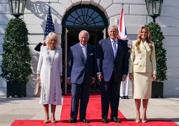 Britain s King Charles III (2nd L) and Queen Camilla (L) are greeted by President Donald Trump (2nd R) and First Lady Melania Trump as they arrive at the White House in Washington DC on Monday, April 27, 2026. The king is on a four-day state visit to the U.S. and will stop in New York and Washington, where he will meet with U.S. officials and deliver an address to Congress.  WAX20260427805 AllisonxRobbert