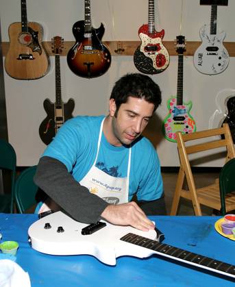 GIBSON GUITA JR Dec. 4, 2004 - Beverly Hills, CALIFORNIA, USA - K40723JR.GIBSON GUITAR PAINT FOR PEP CHARITY EVENT..AT THE GIBSON BALDWIN SHOWROOM BEVERLY HILLS, CA..12-04-2004. JAIMIE RODRIGUEZ 2004.DAVID SCHWIMMER Copyright: xJaimiexRodriguezx