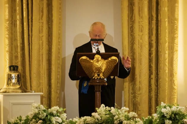 Great Britain s King Charles III presents the original bell from the H.M.S. Trump, a World War II-era submarine and inscribed Trump 1944 , as a gift to President Donald Trump during a State Dinner in the East Room of the White House on Tuesday, April 28, 2026 in Washington, D.C. Charles spoke to a joint session of Congress earlier in the day, and attended several events with U.S. President Donald Trump.  WAX20260428230 CraigxHudson