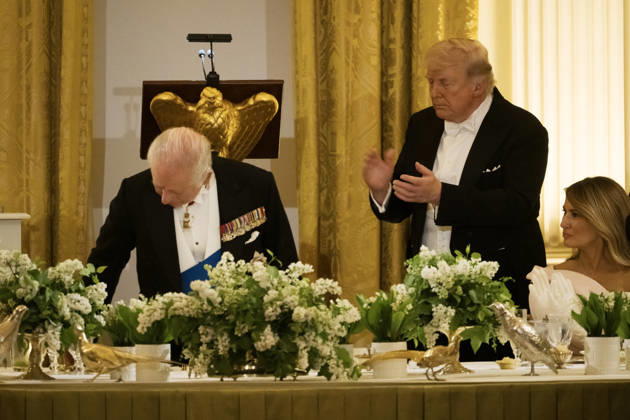 President Donald Trump claps after Great Britain s King Charles gives remarks during a state dinner with President Donald Trump and First Lady Melania Trump at the White House on Tuesday, April 28, 2026 in Washington, D.C. Charles spoke to a joint session of Congress earlier in the day, and attended several events with U.S. President Donald Trump.  WAX20260428225 CraigxHudson