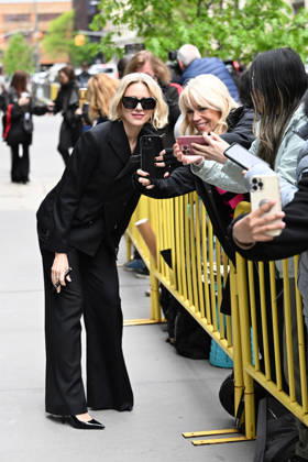 Naomi Watts poses for selfies with fans outside ABC studios in New York. Watts was spotted in a chic black suit and Celine sunglasses and bag Featuring: Naomi Watts Where: New York City, New York, United States When: 29 Apr 2026 Credit: Elder Ordonez INSTARimages EDITORIAL USE ONLY. NOT FOR USE BY NEWSPAPERS BASED IN THE UK. Copyright: xx instar55653349